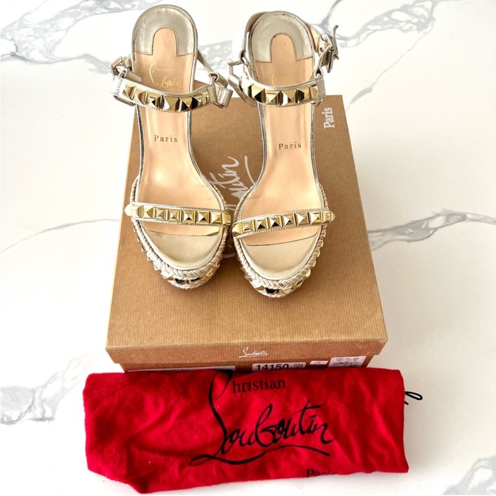 Christian Louboutin Gold wedge with Studded Detailing
